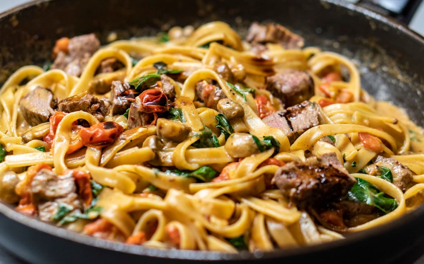 A finished pasta dish on the table